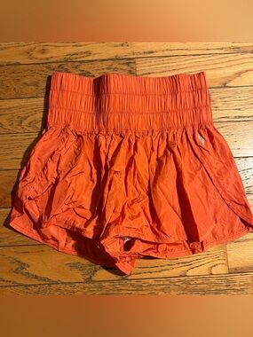 FP Movement by Free People Bright Orange Smocked Waist Athletic Shorts